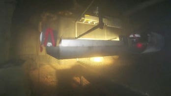 Japan aims to extract sample from remains of country's worst-ever nuclear disaster