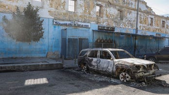 Haiti orders nightly curfew after armed gangs jailbreak thousands of 'violent inmates'