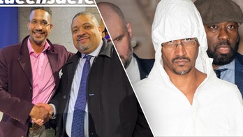 Ex-con NYC murder suspect smiles with DA Bragg shortly before shocking arrest