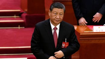 China's congress closes annual session with near-unanimous support for Xi Jinping