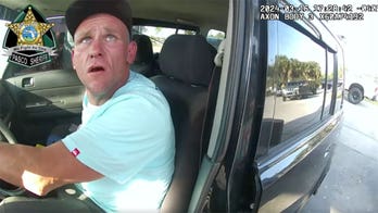 Bodycam captures deputy confront, fatally shoot suspect while dangling from car door