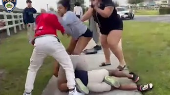 Florida woman 'instigated, jeered and intervened' in student school bus fight in wild melee video: police