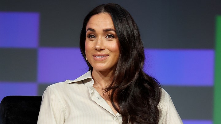 Prince Harry, Meghan Markle make rare public appearance at movie premiere