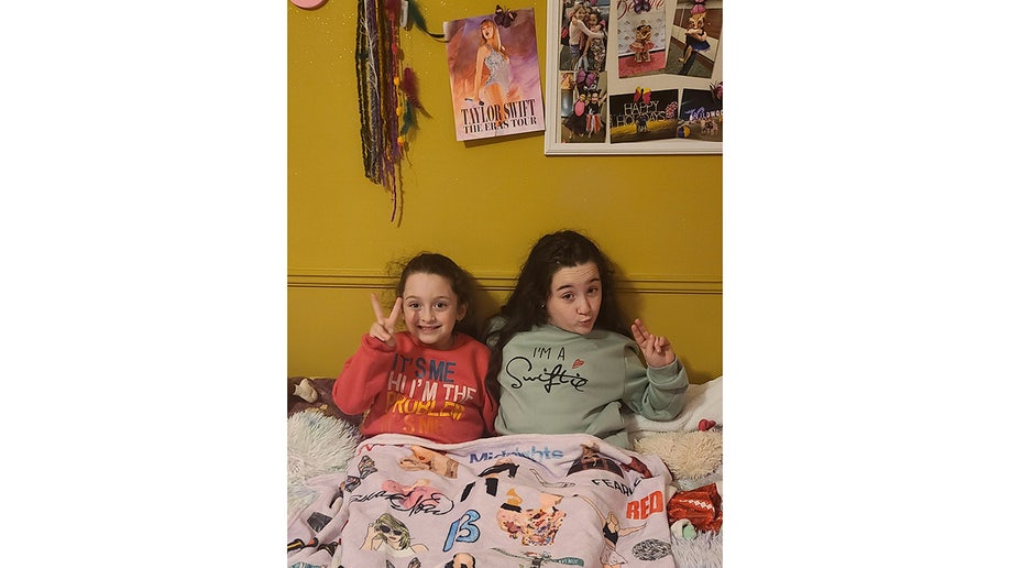 campione daughters in taylor swift themed room