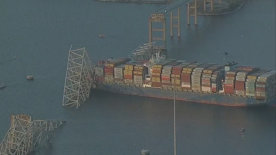 Cargo ship stuck in water after colliding with a Baltimore bridge.
