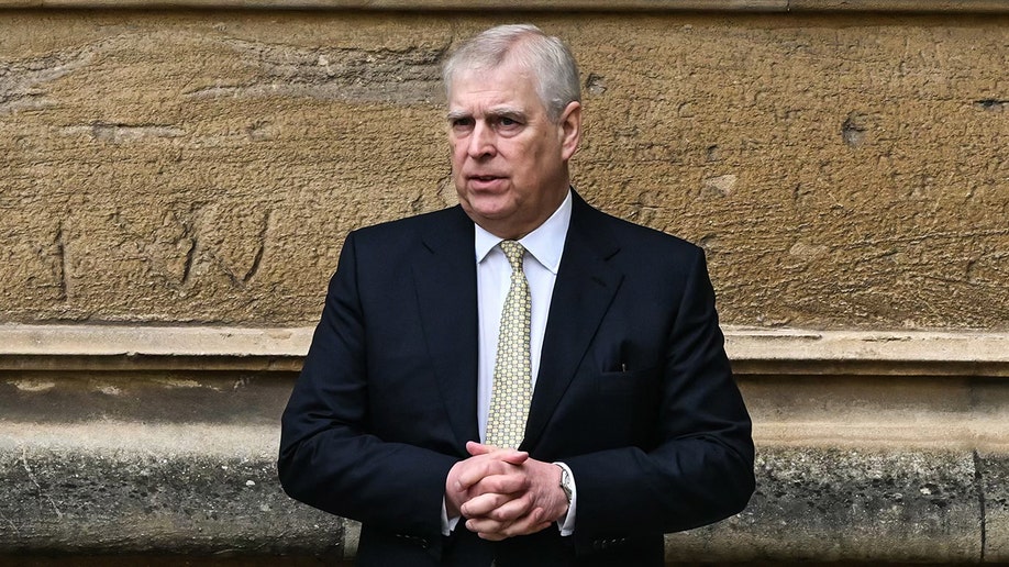Prince Andrew outside St. George's Chapel for Easter with his hands together