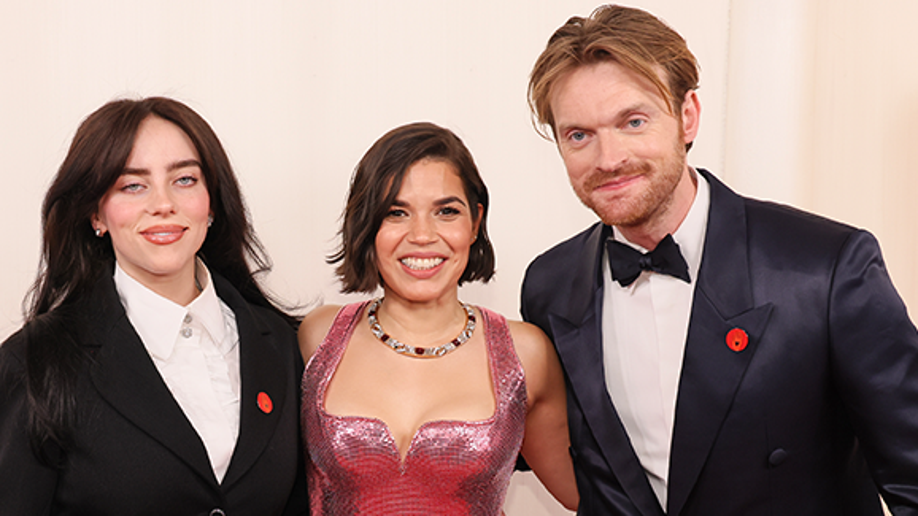 HOLLYWOOD, CALIFORNIA - MARCH 10: Billie Eilish, America Ferrera, and FINNEAS attend the 96th Annual Academy Awards on March 10, 2024 in Hollywood, California. (Photo by Rodin Eckenroth/Getty Images)