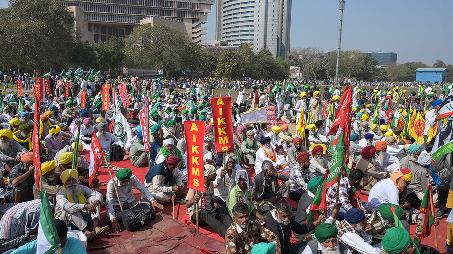 Protesting farmers flood India’s capital demanding law to guarantee minimum crop prices