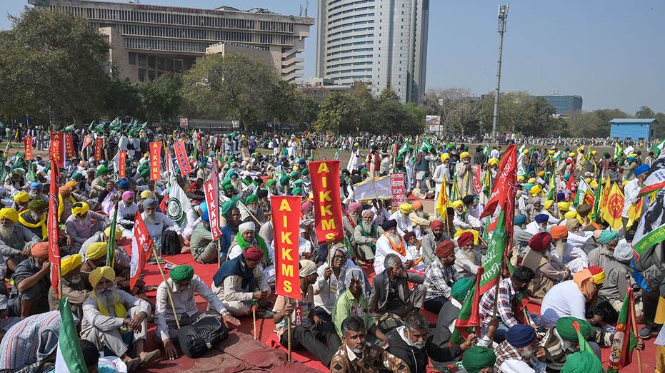 Protesting farmers flood India’s capital demanding law to guarantee minimum crop prices