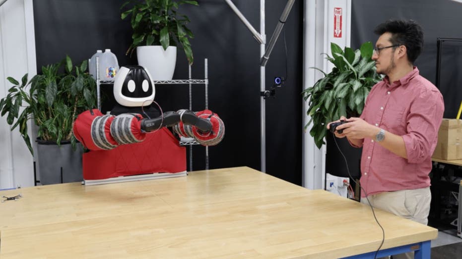 Forget hands, Toyota’s hug-ready robot picks up with its entire body