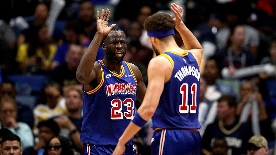 Warriors' Klay Thompson uses boat to rescue longtime teammate Draymond Green from bridge during protests