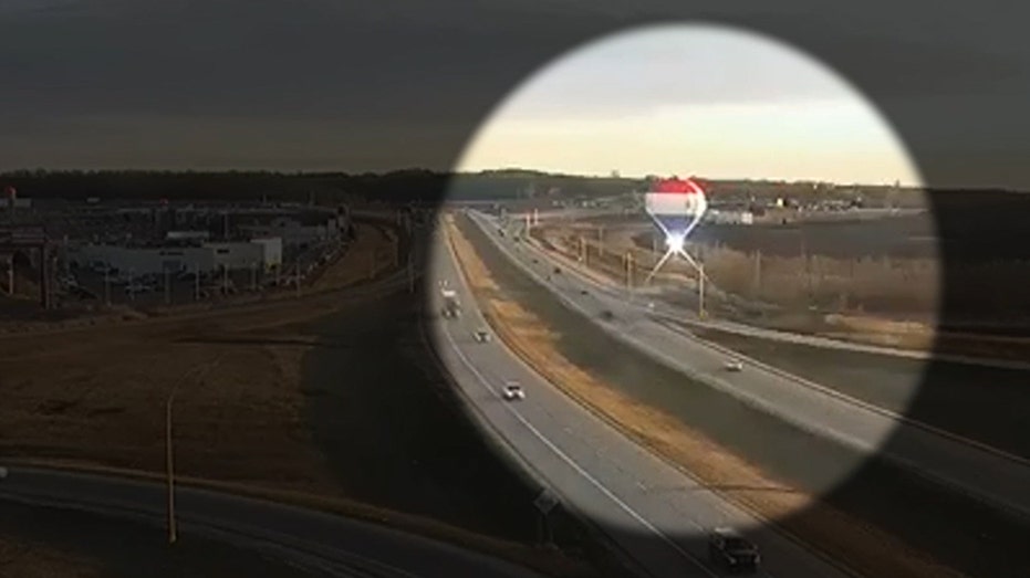 Hot-air balloon crashes into power line, basket breaks off and sparks fly: video