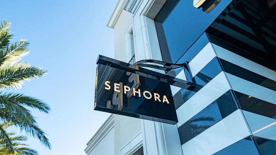 Sephora store sign with palm tree in background