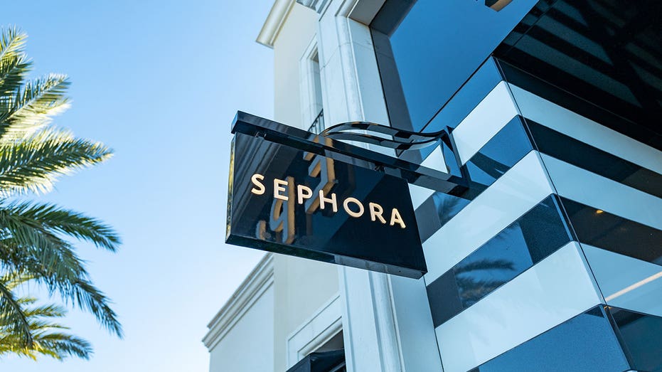 Sephora store sign with palm tree in background