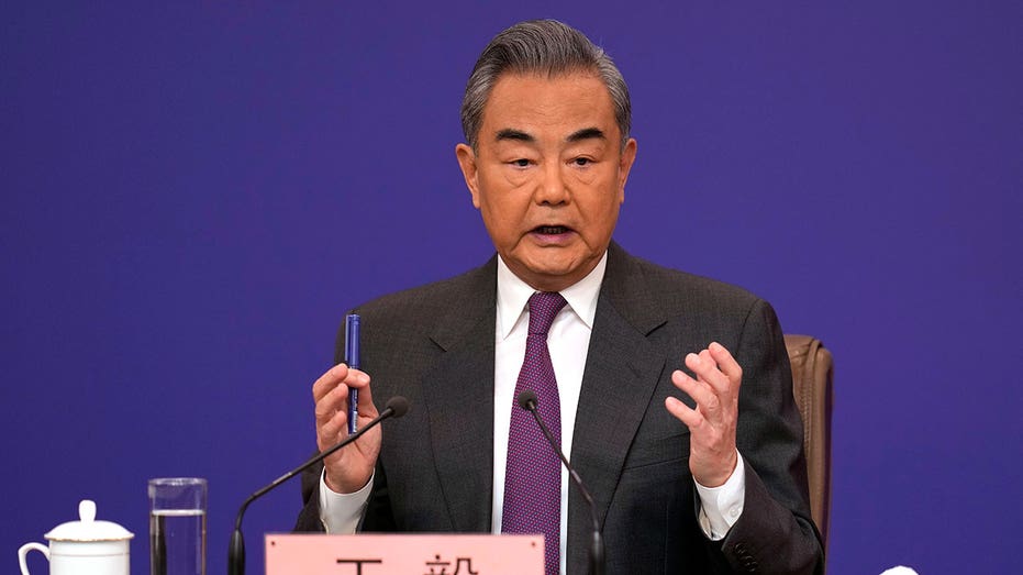 China’s foreign minister accuses US of devising tactics to suppress China