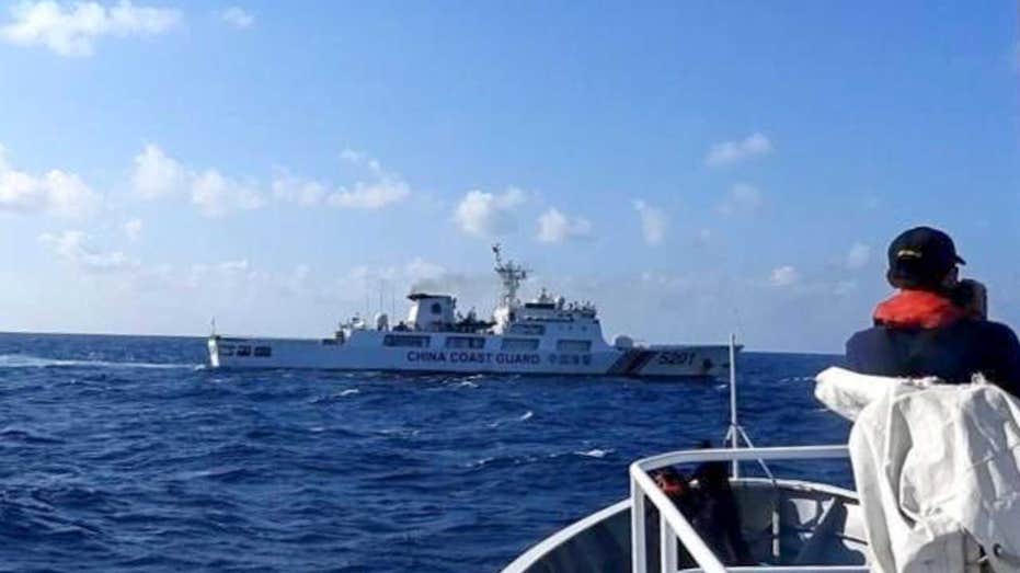 China’s coast guard attempts to block Philippine vessels carrying scientists