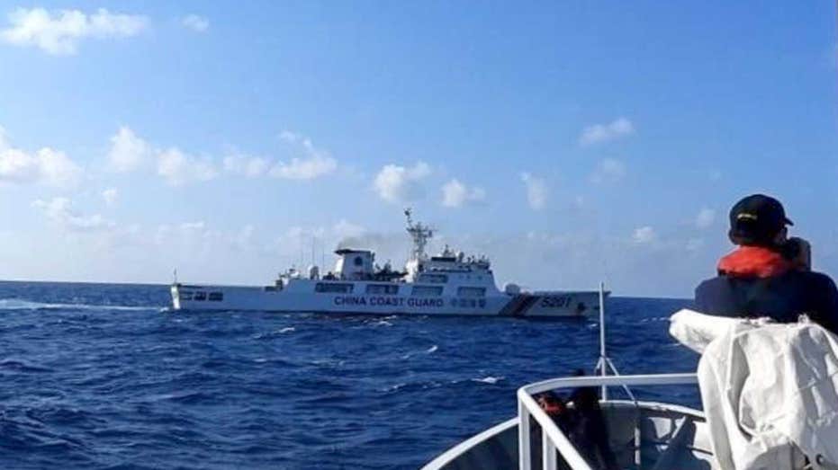 China’s coast guard attempts to block Philippine vessels carrying scientists