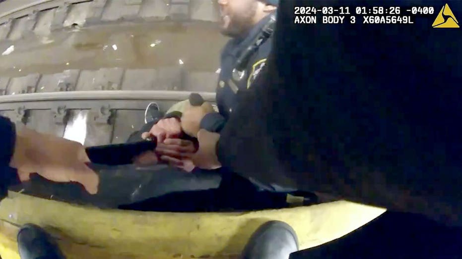 Bodycam video shows NYPD officers spring into action to pull man from subway tracks
