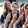 Kate Middleton on a boat with a rowing team