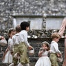Princess Catherine ushers the kids outside the church