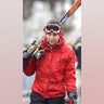 Kate Middleton carries her skis on her shoulder at the snow