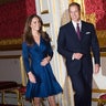 Kate Middleton and Prince William walk into a room at St James's Palace