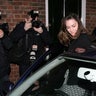 Princess Catherine gets into a car while paparazzi take pictures