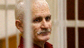 Ales Bialiatski, the head of Belarusian Viasna rights group, stands in a defendants cage during a court session in Minsk, Belarus, on Nov. 2, 2011. In an open letter, 27 Nobel laureates have demanded the release of all political prisoners in Belarus including Ales Bialiatski, the winner of the 2022 Nobel Peace Prize. The Nobel laureates said the situation in Belarus is a &ldquo;humanitarian catastrophe&rdquo; and called for an immediate end to political repression in the country of 9.5 million people.
