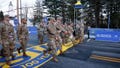 Members of the United States military cross the starting line as they participate in the Boston Marathon, Monday, April 15, 2024, in Hopkinton, Mass.