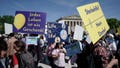 Participants in the 'March for Life' rally stand with banners reading 'Every life is a gift', 'Life is life' and 'Euthanasia no thanks' in Munich, Germany, Saturday, April 13, 2024.