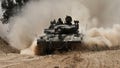 An Israeli tank moves near the Gaza Strip border in southern Israel, on Thursday, April 11.
