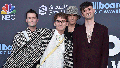 Drew MacFarlane, from left, Dave Bayley, Joe Seaward and Edmund Irwin-Singer of Glass Animals arrive at the Billboard Music Awards on Sunday, May 15, 2022, at the MGM Grand Garden Arena in Las Vegas. The English indie-pop band releases its fourth album on July 19.
