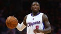Nate Robinson #8 of the Los Angeles Clippers dribbles the ball against the Charlotte Hornets in the second half during the NBA game at Staples Center on March 17, 2015 in Los Angeles, California. The Clippers defeated the Hornets 99-92.