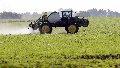 A soybean field is sprayed in Iowa, July 11, 2013. The maker of a popular weedkiller is turning to lawmakers in key states to try to squelch legal claims that it failed to warn about cancer risks. - Fox News