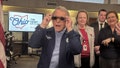 Republican Ohio Gov. Mike DeWine sports a pair of eclipse glasses while talking to reporters at the Ohio Emergency Operations Center in Columbus, Ohio, on Friday, April 5, 2024. DeWine activated the center on Friday to assist communities before, during and after Mondays total solar eclipse, which could draw hundreds of thousands of tourists to the state. (AP Photo/Julie Carr Smyth)