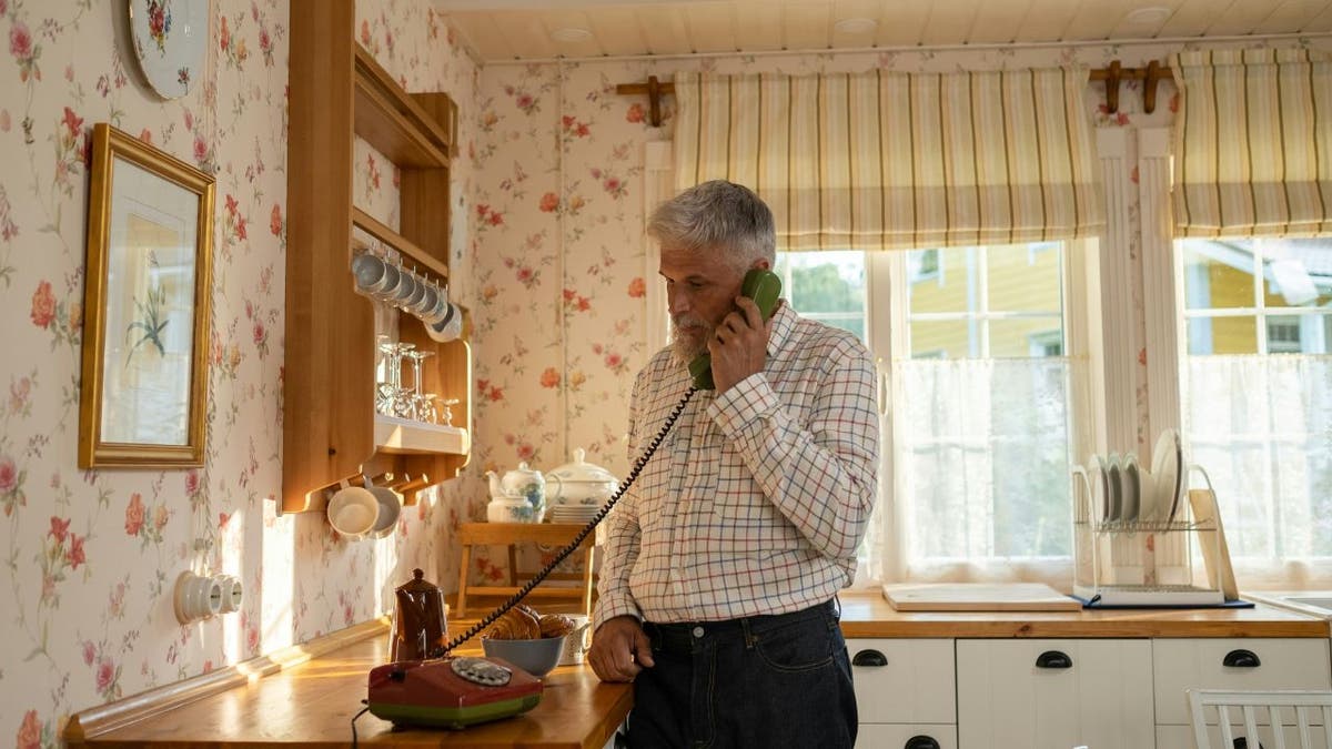 Man talking on a landline phone (Kurt "CyberGuy" Knutsson