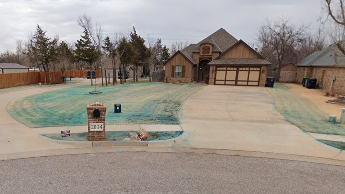 A father killed his wife and three sons in a murder-suicide in this home in in Yukon, Oklahoma.