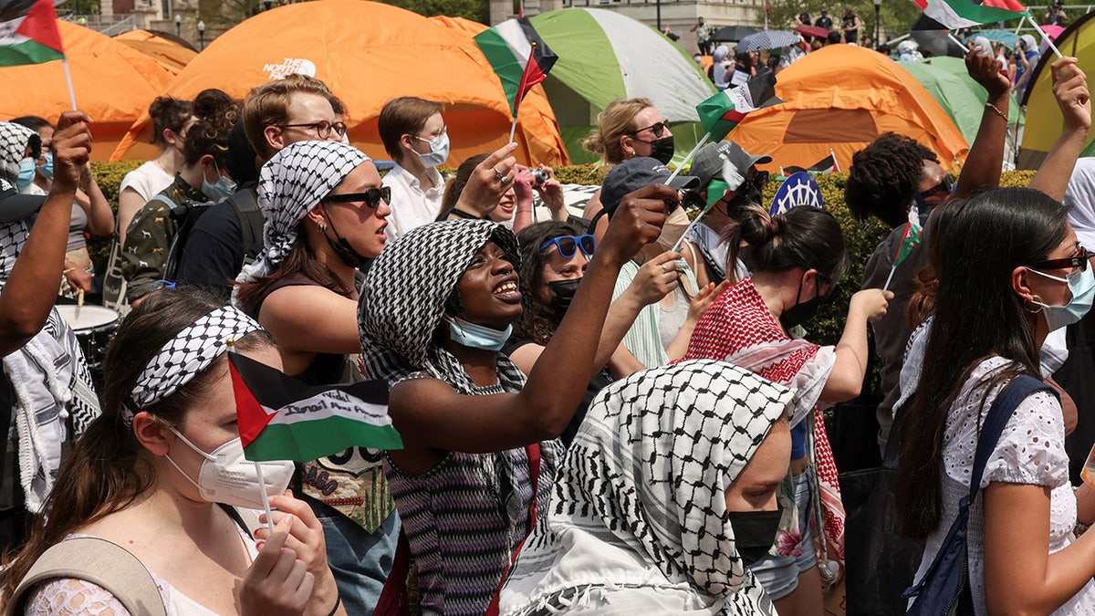 Students march and rally on Columbia University campus in support of a protest encampment supporting Palestinians