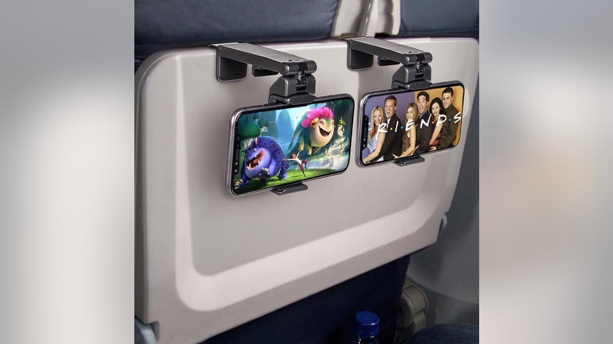 Get caught up on your favorite shows with this phone holder for the airplane.
