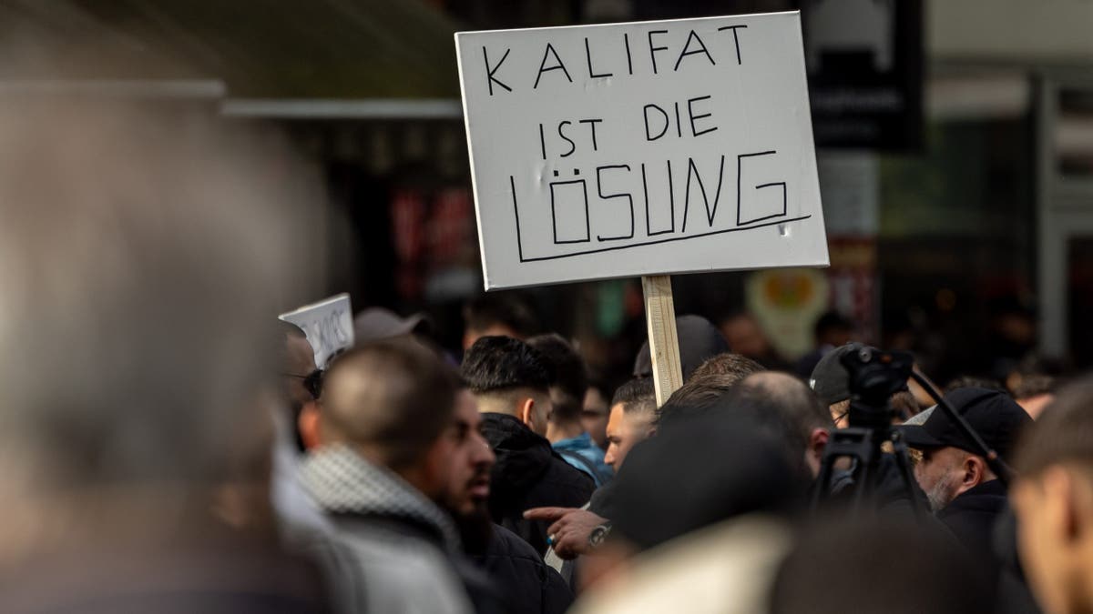 "Caliphate is the solution" sign