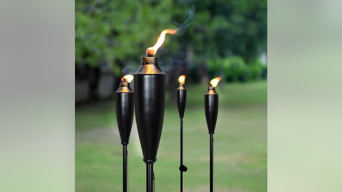 Tiki torches are easily refillable to keep bugs away.