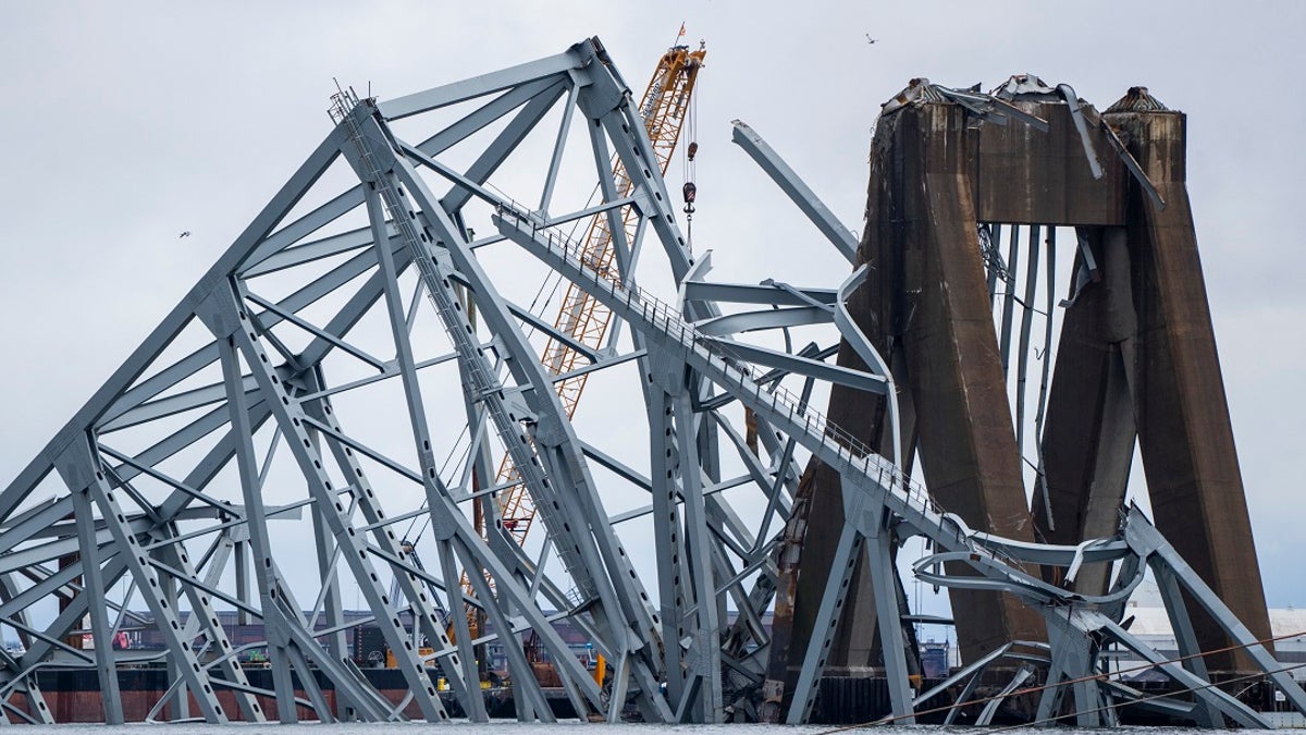 mangled wreckage of Baltimore's Key Bridge