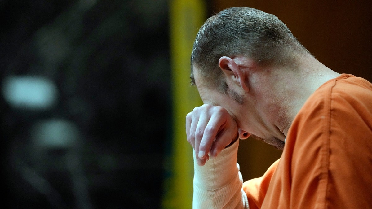 James Crumbley wipes his face after addressing the court during his sentencing, Tuesday, April 9, 2024, in Pontiac, Mich.