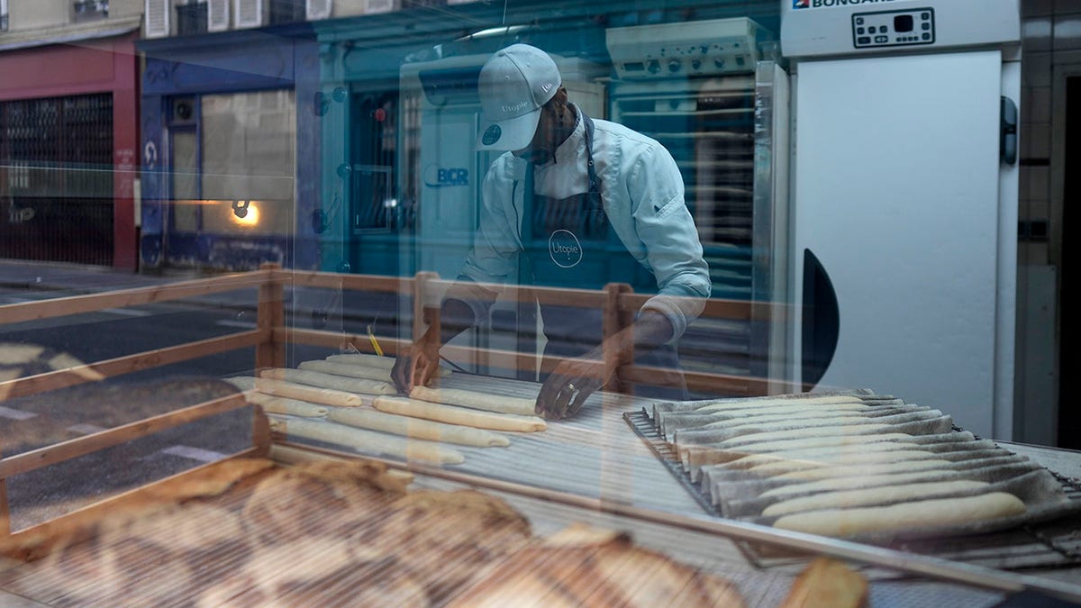 Xavier Netry making baguettes