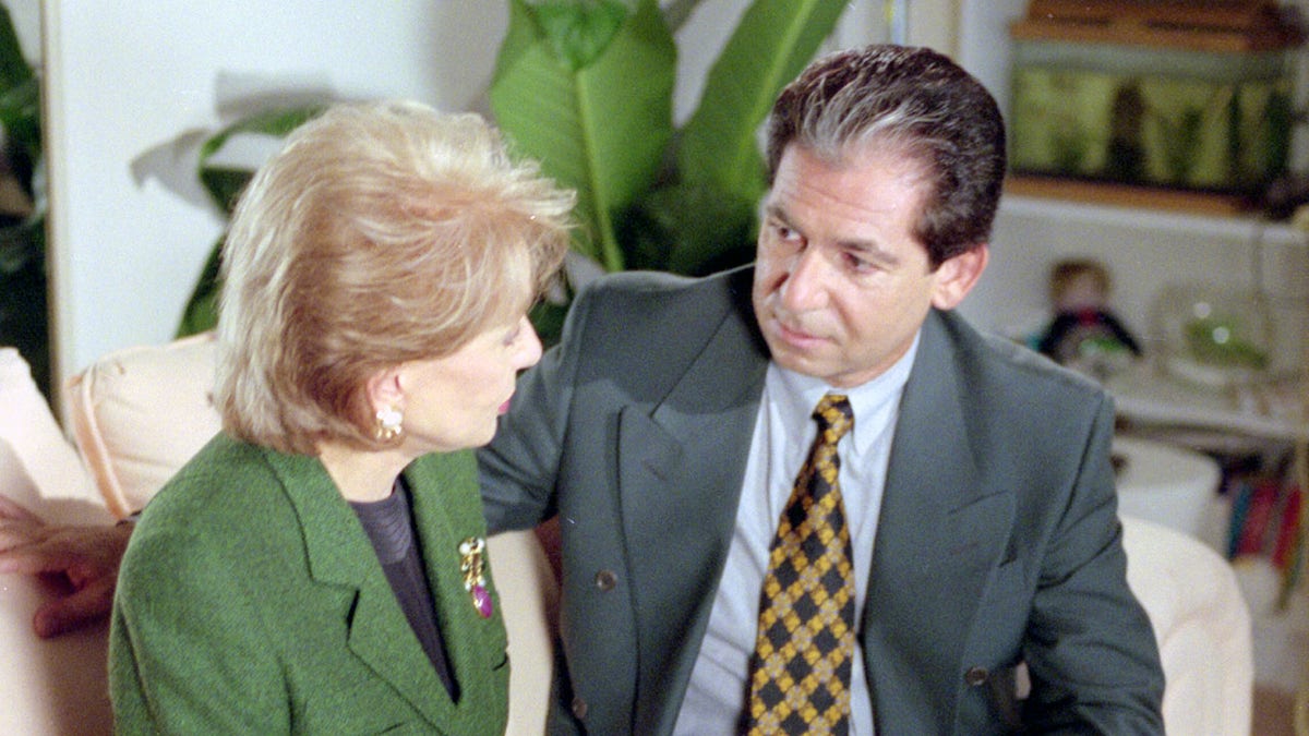 Barbara Walters sitting with Robert Kardashian for interview