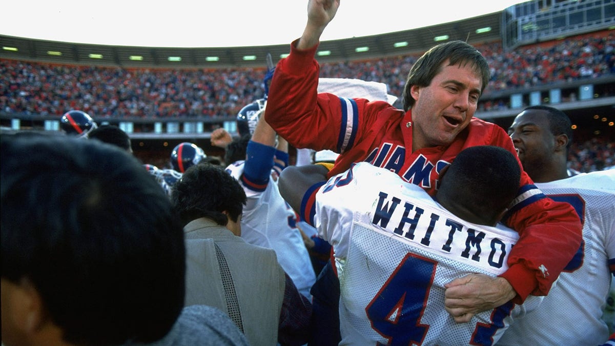 Bill Belichick y David Whitmore