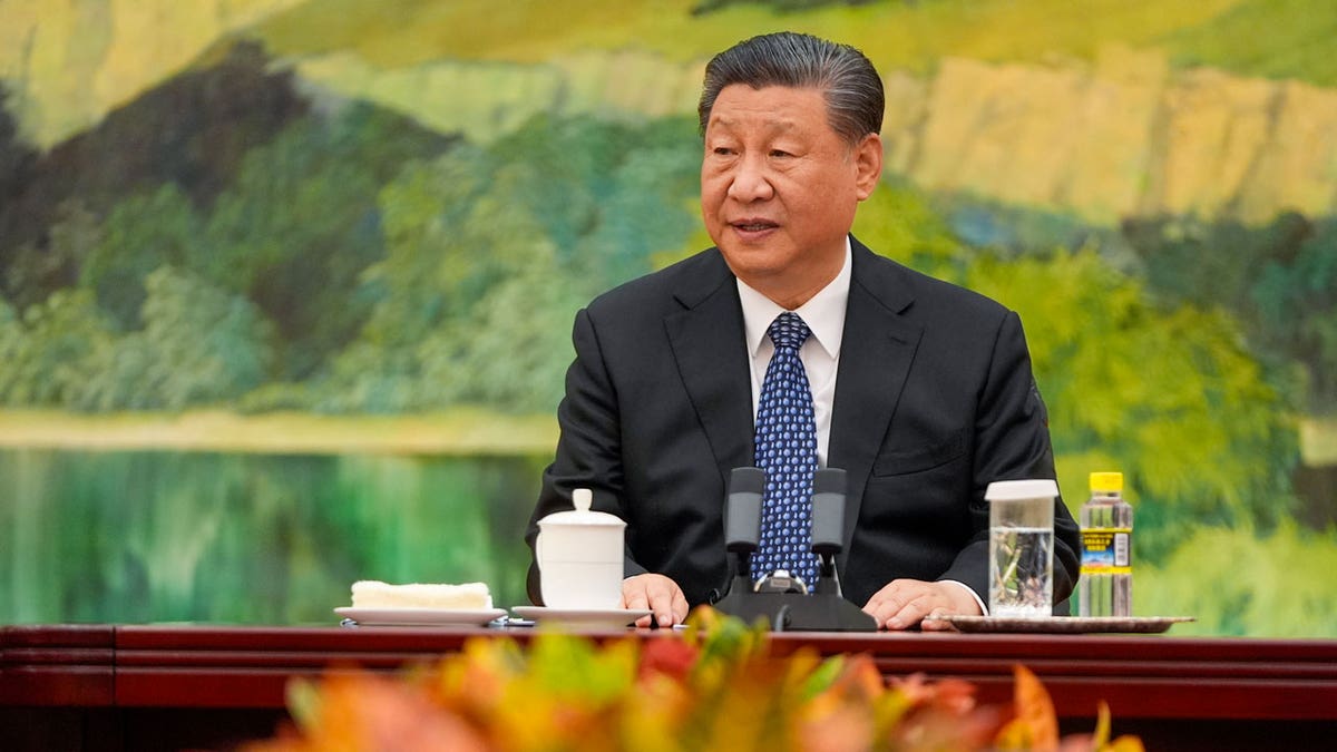 Chinese President Xi Jinping talks to U.S. Secretary of State Antony Blinken astatine nan Great Hall of nan People successful Beijing, China.