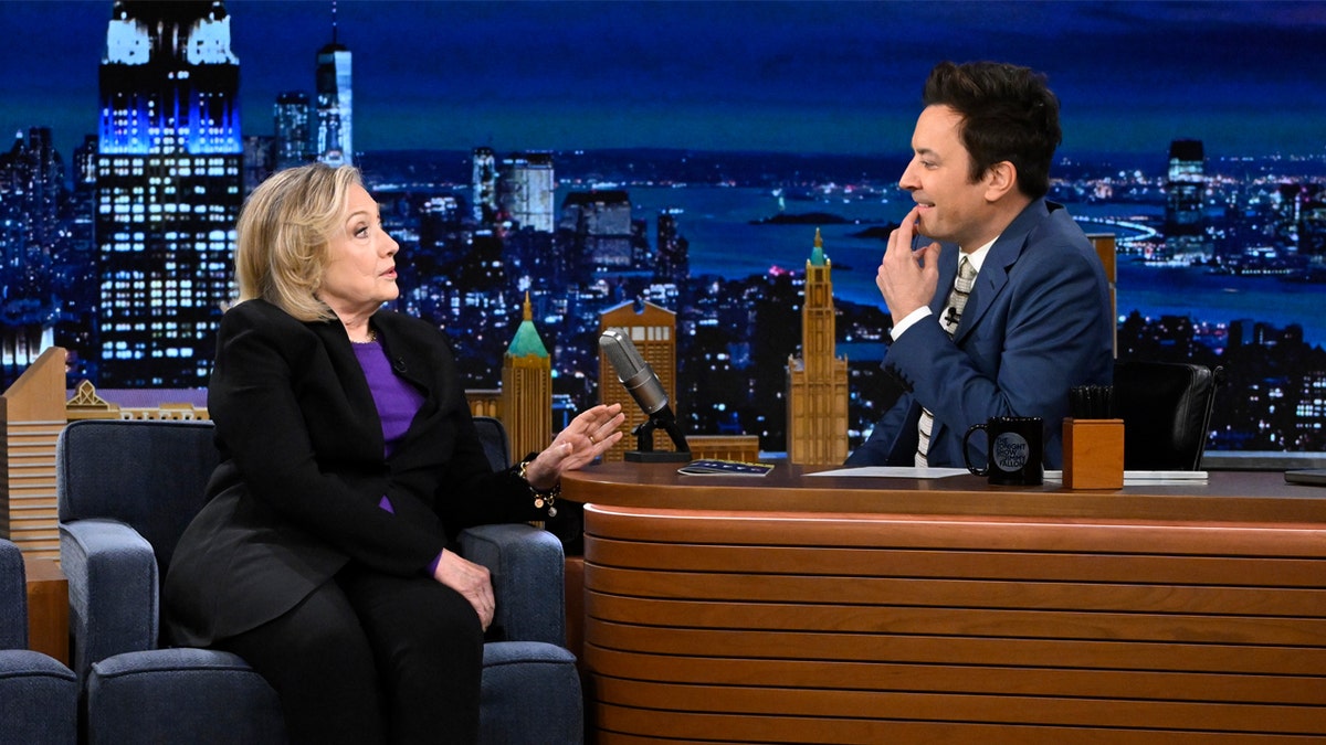 Hillary Clinton sits with Jimmy Fallon