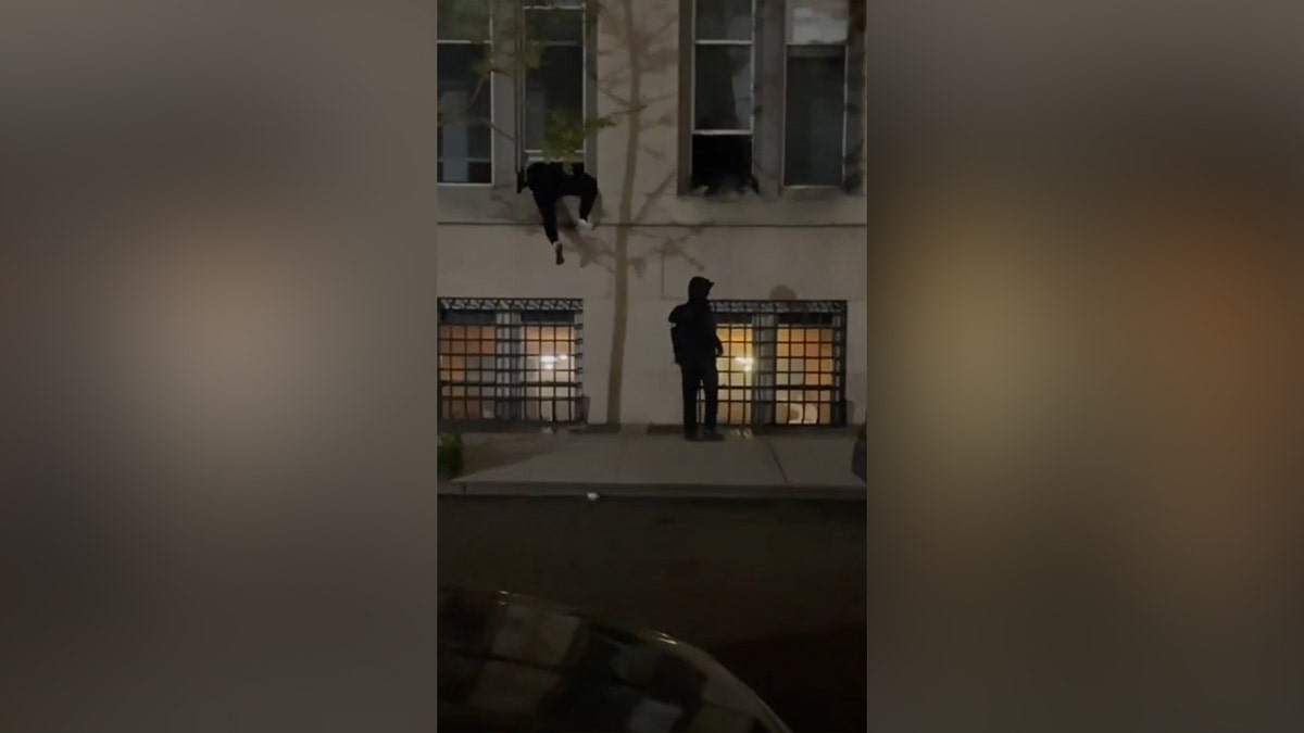 Columbia-Protesters-Scaling-walls-NYPD-provided