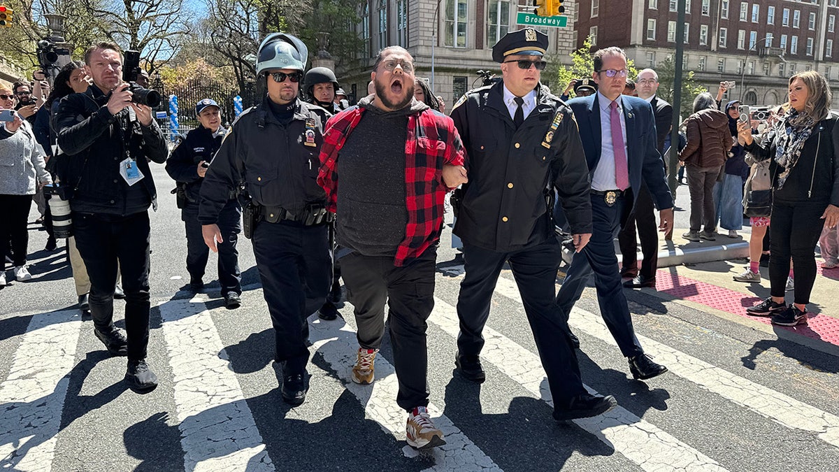 An individual is arrested during a pro-Palestine protestation extracurricular of Columbia University successful New York City